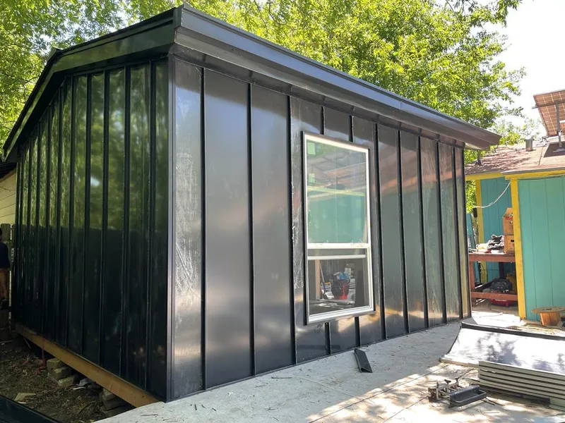 Black standing seam metal wall panels for Roof Inspection in Escondido